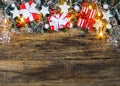 Red Christmas gift boxes on fir tree garland Royalty Free Stock Photo