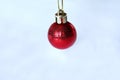 Red Christmas hanging ornament isolated on white background