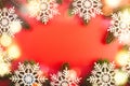 Red Christmas holidays background; greeting card , Christmas card with fir and decor on glitter background Royalty Free Stock Photo