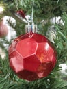 Red Christmas Ornament Hanging on a Christmas tree Royalty Free Stock Photo