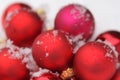 Red christmas bauble decoration covered in snow Royalty Free Stock Photo