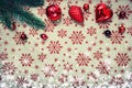 Red Christmas ornaments and xmas tree on canvas background with red glitter snowflakes. Xmas card. Happy New Royalty Free Stock Photo