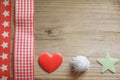 Red christmas ribbon, a fluffy ball, a star and a love heart Royalty Free Stock Photo