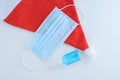 Red Christmas Santa hat medical protective mask and hand sanitizer isolated white background Royalty Free Stock Photo