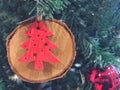 A red Christmas shape tree on wood timber decorating during on happy season