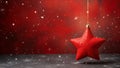 Red Christmas Star Ornament Hanging on Starry Backdrop Royalty Free Stock Photo