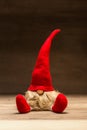 Red christmas tad in front of dark wooden background Royalty Free Stock Photo