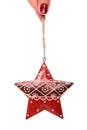 Red christmas tree decor in form of star with ornament Royalty Free Stock Photo