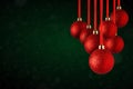 Christmas tree ornaments hanging. Balls made of glass or plastic hanging over abstract background Royalty Free Stock Photo