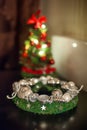 Red christmas wreath with decorations. Holiday interior Royalty Free Stock Photo