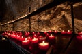 Red church candles in Rocamadour Royalty Free Stock Photo