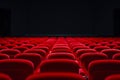 Red cinema seats in a dark room Royalty Free Stock Photo