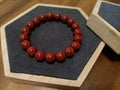 Red Cinnabar bits in crystal body beads bracelet