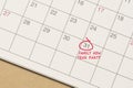 Red circle mark on the calendar at 31 for reminder of family new year party.