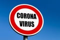 A red circle traffic sign demanding the corona virus SARS-CoV-2 and COIVID-19 disease to stop