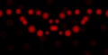 Red circles on black background. Abstract bokeh background illustration. Beautiful red abstract lights.