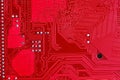 Red circuit board texture background of computer motherboard Royalty Free Stock Photo