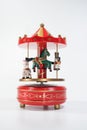 Red circus carousel with a wonderful house wooden toy