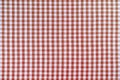 Red classic checkered tablecloth texture, background with copy space. Royalty Free Stock Photo