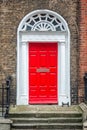 Red classic door in Dublin, example of georgian typical architecture of Dublin Ireland Royalty Free Stock Photo