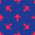 Red Classic iron fence with metal pillars icon isolated seamless pattern on blue background. Ancient wrought iron fence Royalty Free Stock Photo