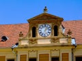 Red clay beavertail sloped mansard roof and renaissance style exterior facade detail