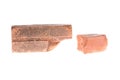 Red clay brick deduct on white background