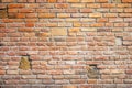 Red clay brick mixed with stones wall old texture. Royalty Free Stock Photo