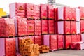 Red clay bricks stacked on pallets