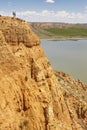 Red clay erosion gully and river. Eroded landscape. Spain