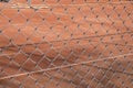 Red clay tennis court surface Royalty Free Stock Photo