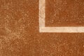 Red clay tennis court. White lines on a clay tennis court. Royalty Free Stock Photo