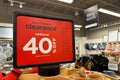 Red clearance sales word banner at clothing store entrance. 40 percent discount offer in store Royalty Free Stock Photo