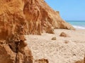 Red cliffs at a beautiful Algarve beach in Portugal Royalty Free Stock Photo