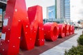 Red climbing word on playgroung on street of Moscow