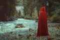 Red cloaked person