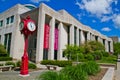 Red Clock and Modern Campus Building at Bloomington University Royalty Free Stock Photo