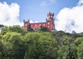 Red clock tower of the Pena National Palace in Sintra town, Portugal Royalty Free Stock Photo