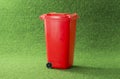 Red closed garbage bin container