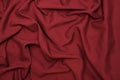 Red cloth forms an irregular pattern as