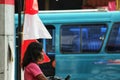 red clothing person blue vehicle child girl pink spring costume woman face of asian homeless was standing on the street