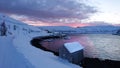 Red Cloud Reflecting In The Water At Sunset Over Akkarfjord Royalty Free Stock Photo