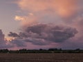 Red clouds over the plain.