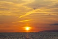 Red Clouds Sunset Above Water. Seascape in Early Morning, Sunrise Over Sea. Nature Landscape. Bright red Sunset Royalty Free Stock Photo