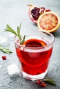 Red cocktail with blood orange and pomegranate. Refreshing summer drink. Holiday aperitif for Christmas party. Royalty Free Stock Photo