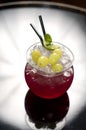 Red cocktail with grapes Royalty Free Stock Photo