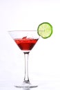 Red cocktail with lime on white Royalty Free Stock Photo