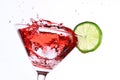 Red cocktail with lime on white Royalty Free Stock Photo