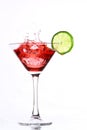 Red cocktail with lime on white Royalty Free Stock Photo