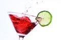 Red cocktail with lime on white Royalty Free Stock Photo